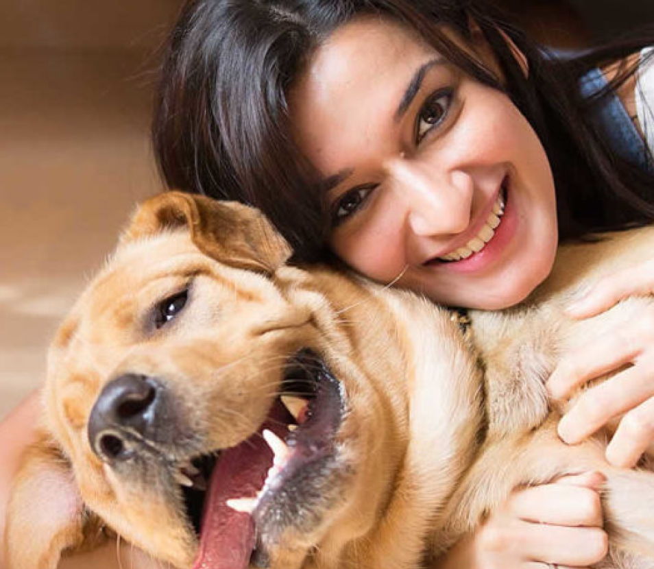 Chef Akanksha Arora and her Labrador. Click to know more about us