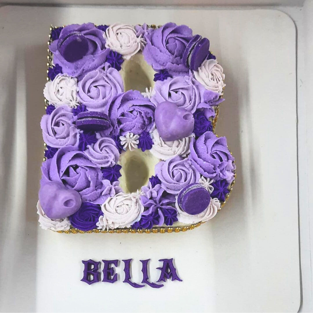 Alphabet shaped cake for dog by Barker's Dozen Pet Bakery