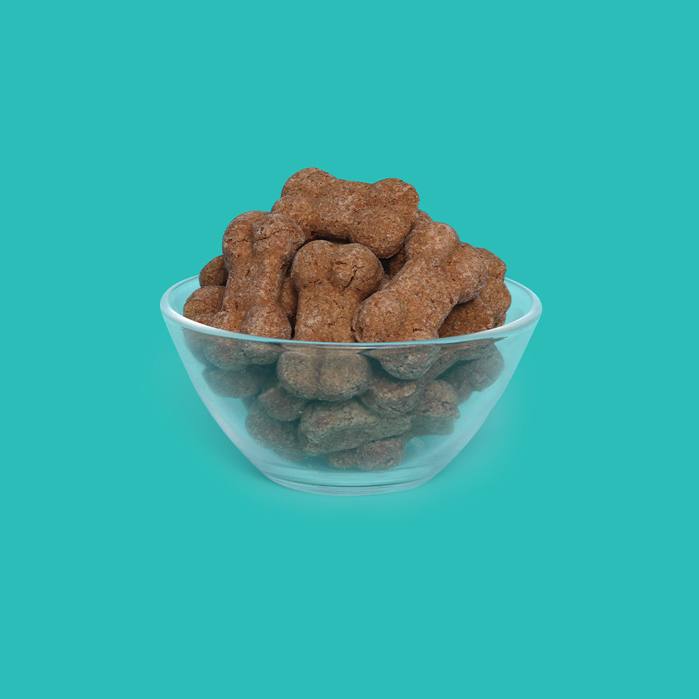 Bite sized chicken treat biscuits for dogs by Baker's Dozen Pet Bakery