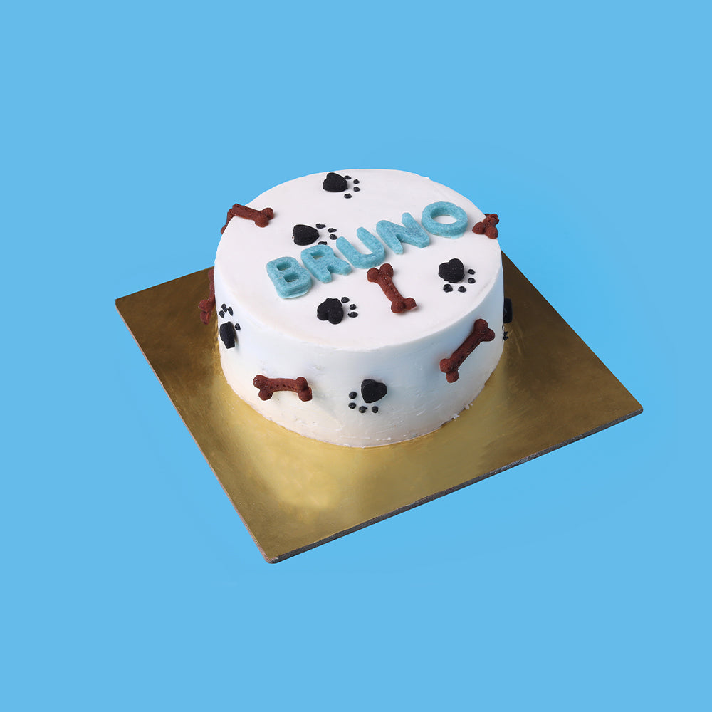 Paw and bones design custom cake for dog birthday by Barker';s Dozen Pet Bakery