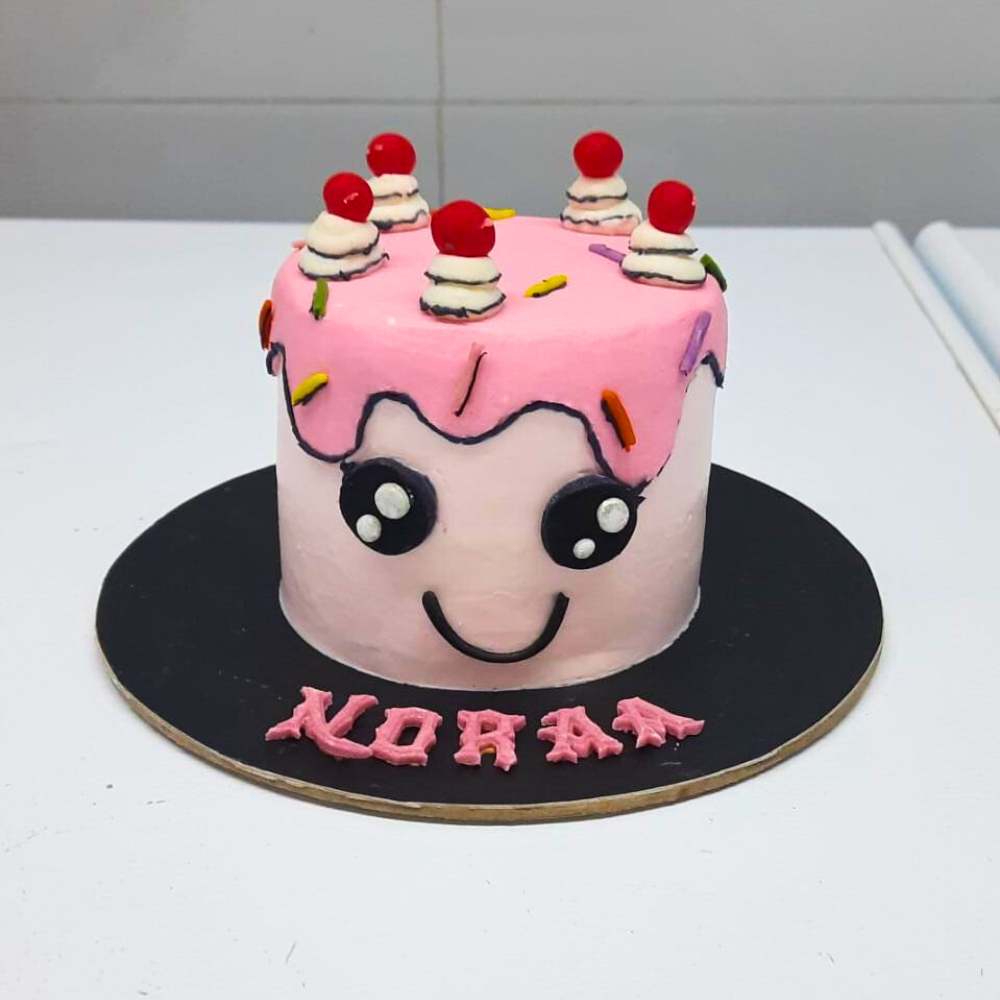 Custom Tall Pink colour Dog birthday cake smiley face theme for Dog's birthday, by Barker's Dozen Pet Bakery