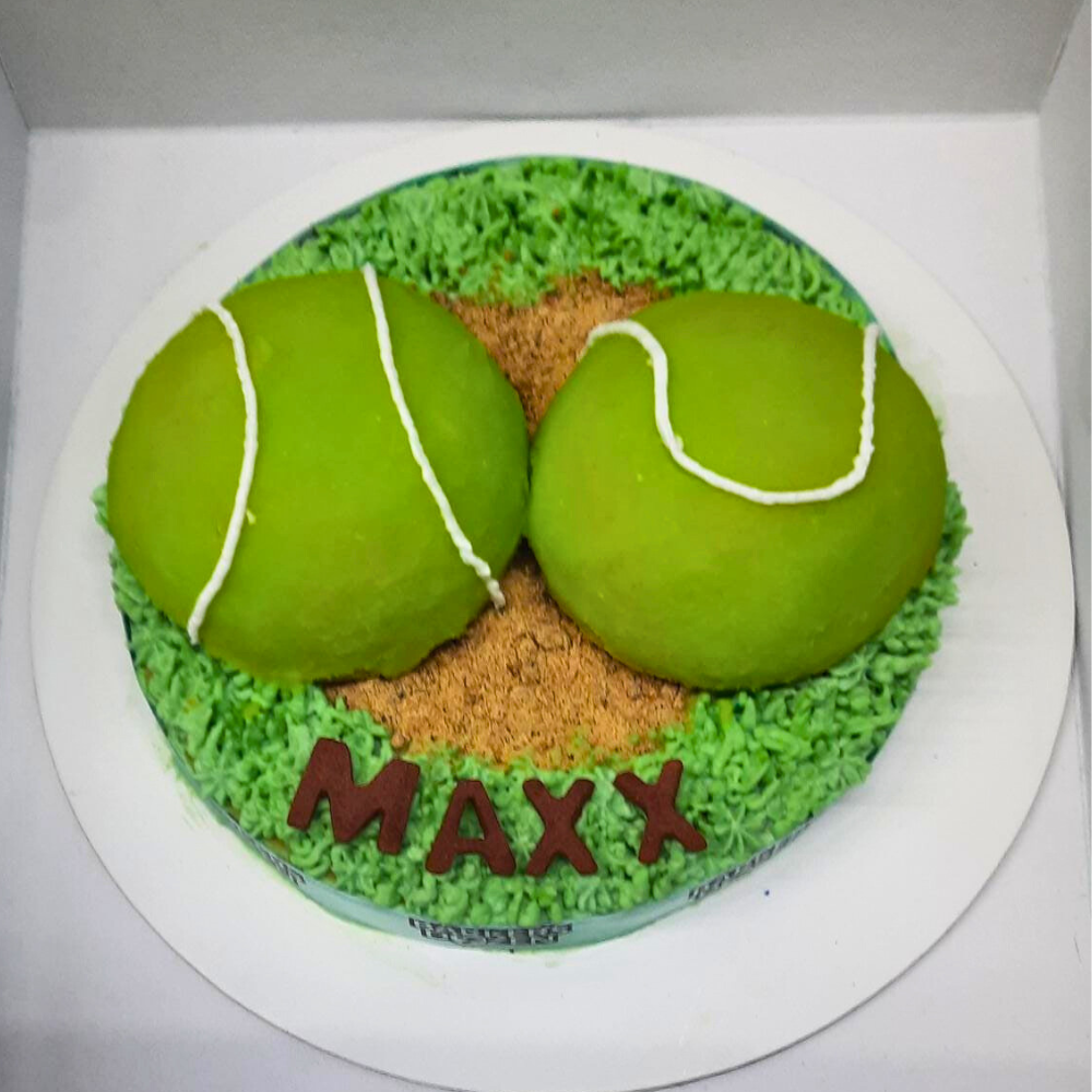 Large Tennis ball cake for dogs, made with natural ingredients and colours by Barker's Dozen Pet bakery