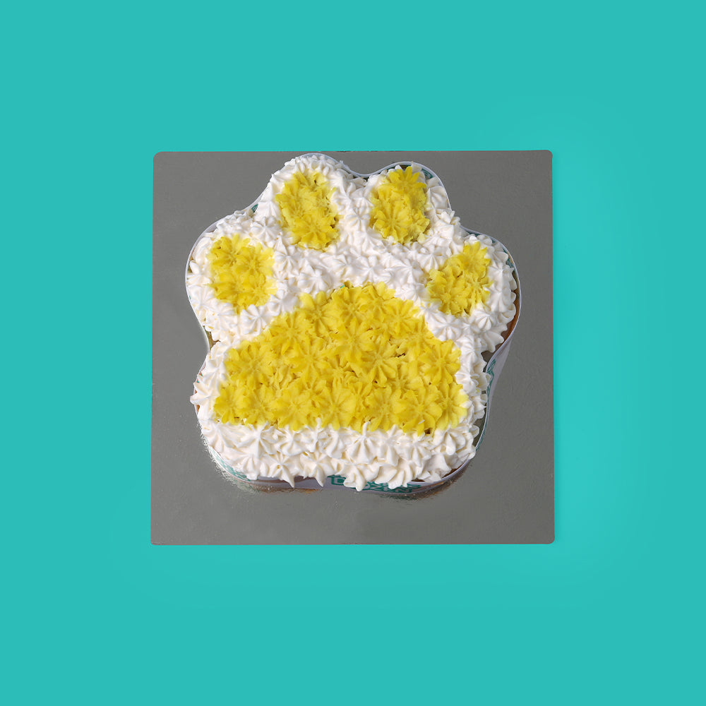 Paw shaped cake for dog birthday by Barker's Dozen