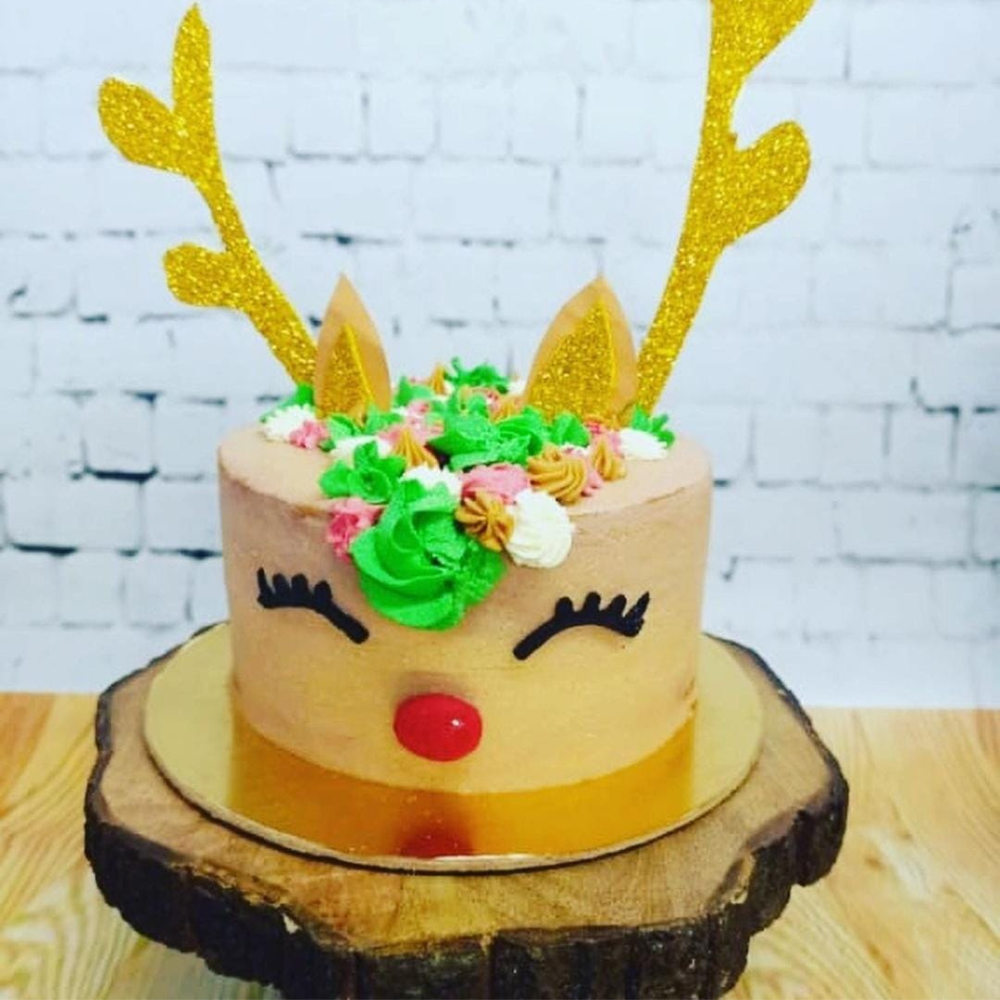 Reindeer themed dog cake made by Barker's Dozen Pet bakery